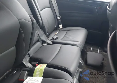 2023 Honda Odyssey Touring z USA, uszkodzony, nr VIN 5FNRL6H87PB019264